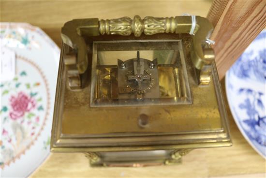 A carriage clock H.16cm x W.11cm